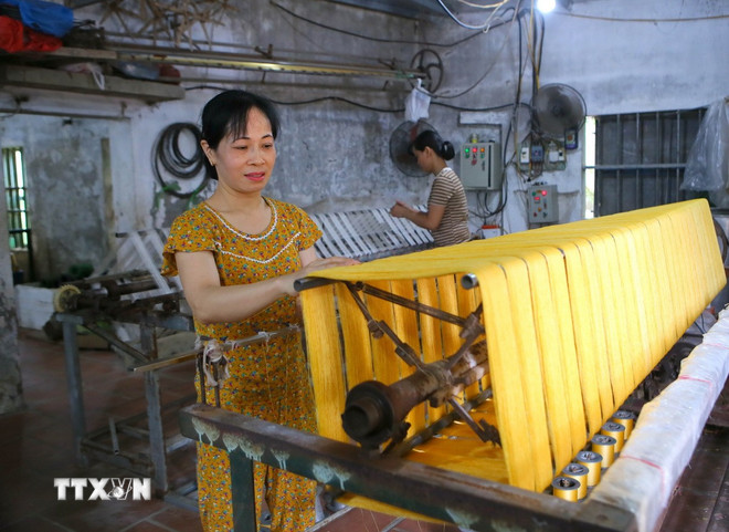 A silk spinning facility in Co Chat village.