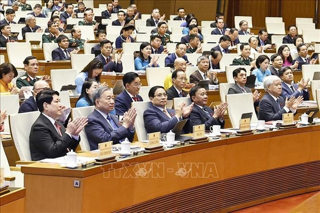 Party General Secretary To Lam (second, left), other Party and State leaders, and NA deputies attend the opening session. (Photo: VNA)