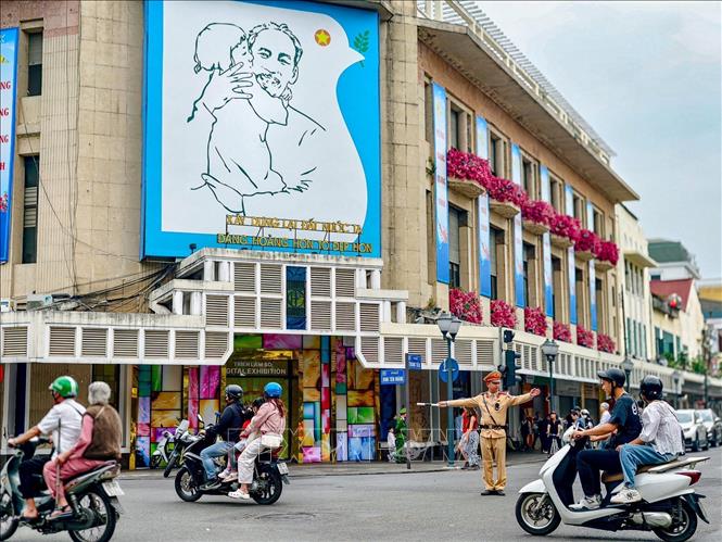 Police offices maintain traffic order and safety during the Lunar New Year (Tet) holiday