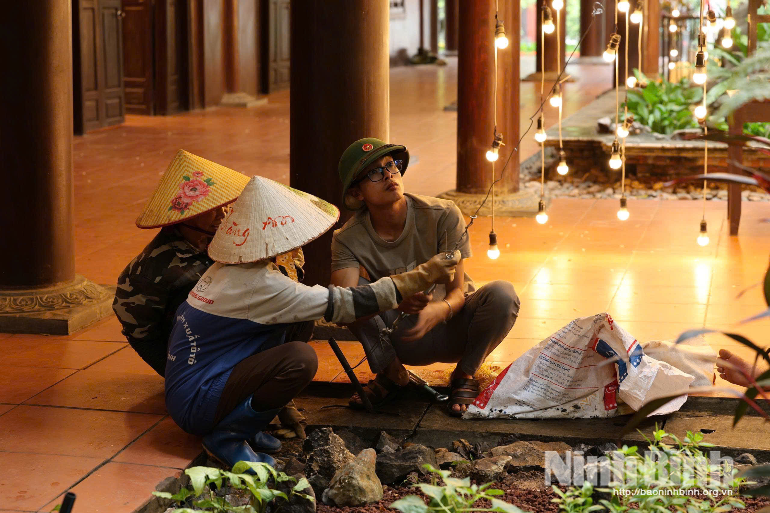 Staff at Trang An Ecological site inspect electricity system to ensure safety during rainy season.